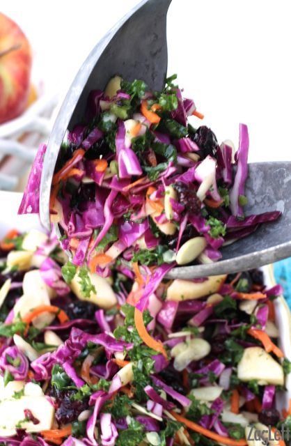 I love the flavors in this beautiful Apple, Kale and Cabbage Salad. Crunchy carrots, raw kale and red cabbage mixed alongside