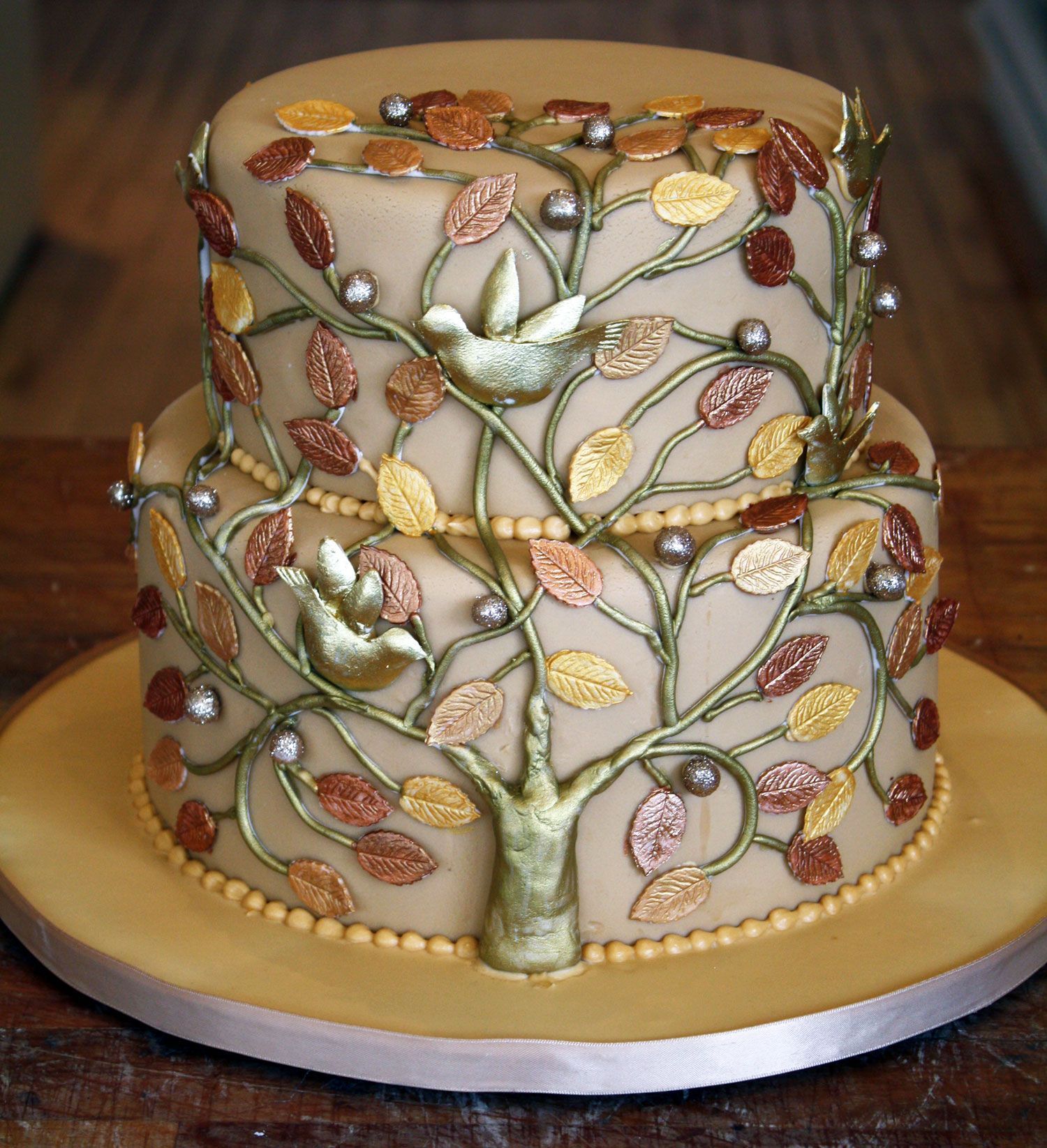 incredible copper and gold tree of life cake at KG “The Art of Cakes” Parent’s 50th anniversary idea