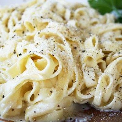 Light Alfredo Sauce  1 	cup low-fat milk  1½ 	T. cornstarch  1 	Cup reduced sodium chicken broth  ¼ 	cup light cream cheese  ½