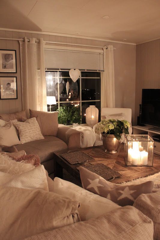 Love this cozy living room- curtains, lights