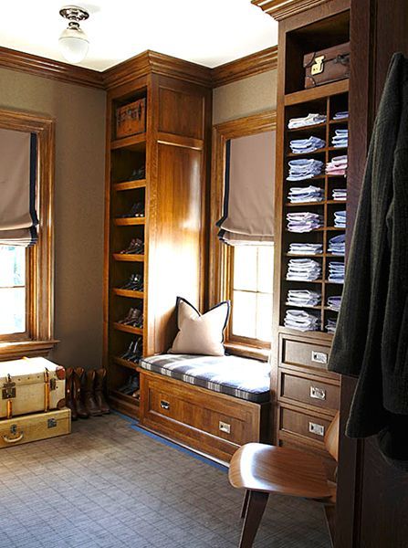 Masculine closet – dark wood – open shelves  cubbies – window seat – Roman shade – Gardiner and Larson Homes