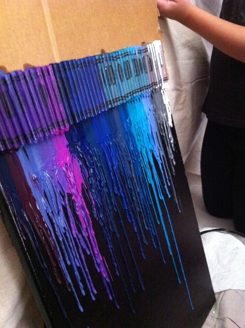 Melted crayon art! so THATS how they do it without the crayons glued to the actual back!!