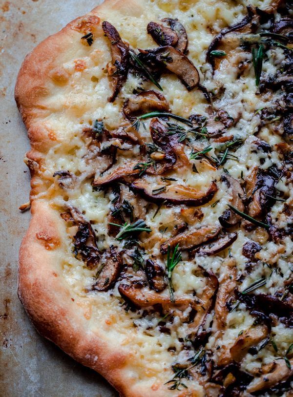 Mushroom Pizza with Havarti Cheese, Fresh Herbs, and White Truffle Oil. A decadent and hearty vegetarian pizza recipe for fall and