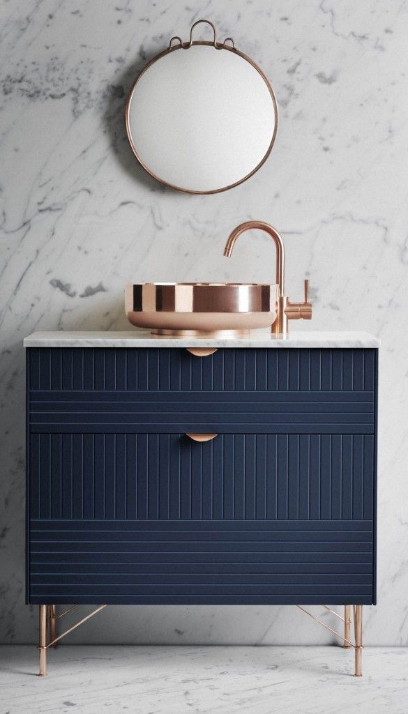 Navy and rose gold bathroom