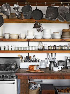 open kitchen shelving — featuring Douglas fir shelving, redwood farm table, pottery barn aged sconce | country living #farmhouse