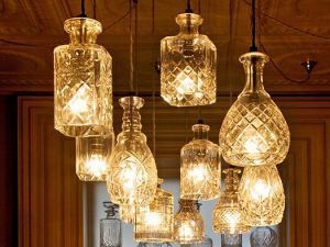 Pendant lights from old whiskey decanters.