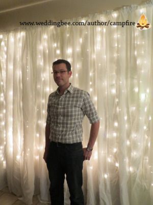 This is a great tutorial on how to make an easy wedding backdrop with Christmas lights.