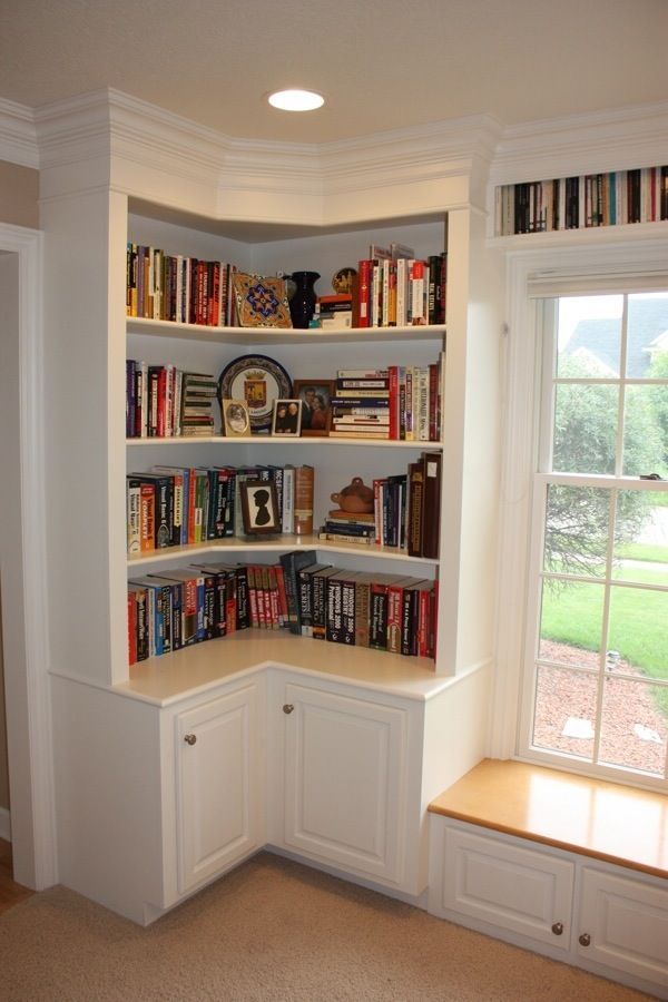 Wrap Around Shelves with Cabinet Doors and that window seat (needs a cushion!)