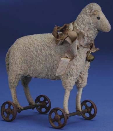 1910 Steiff sheep on wheels, only 6″ . . .  love him!