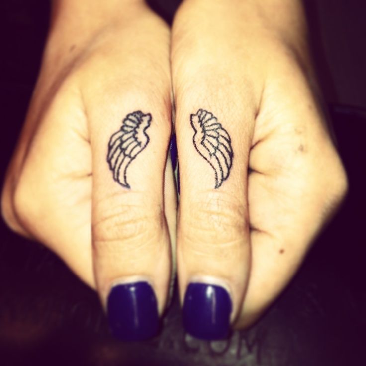 40 Awesome Finger Tattoos. Kind of a different idea than the original wings on back idea! love it!!