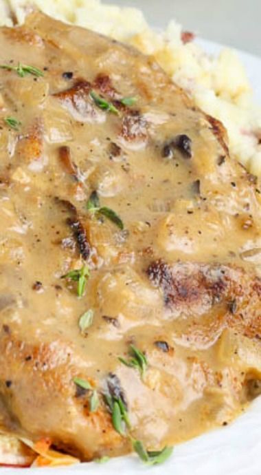 Baked Mushroom Pork Chops ~ seasoned, breaded, and seared before being baked to perfection under a succulent wine and mushroom