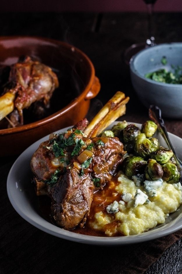 Braised Lamb Shanks & Blue Cheese Polenta with Brussels Sprouts | 31 Cuddly And Delicious Beds Of Polenta