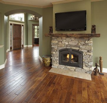 Country Residence – traditional – living room – calgary – by Maillot Homes I like the mantle and the color of the hard wood