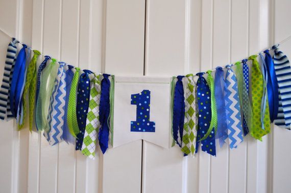 Cute bunting for baby cake smash!  Ribbons and “1” banner.