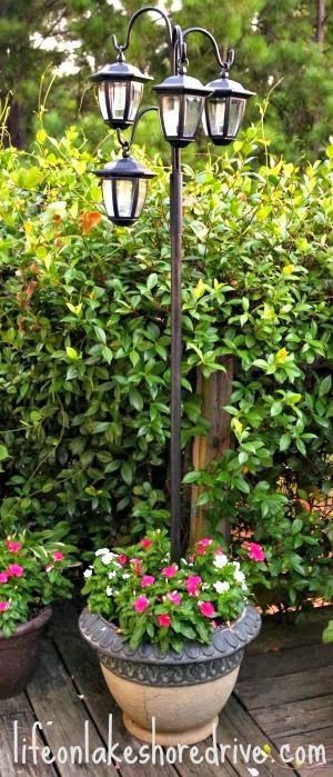 Easy DIY Solar Light Lamp Post with Flower Planter for the entry by our driveway