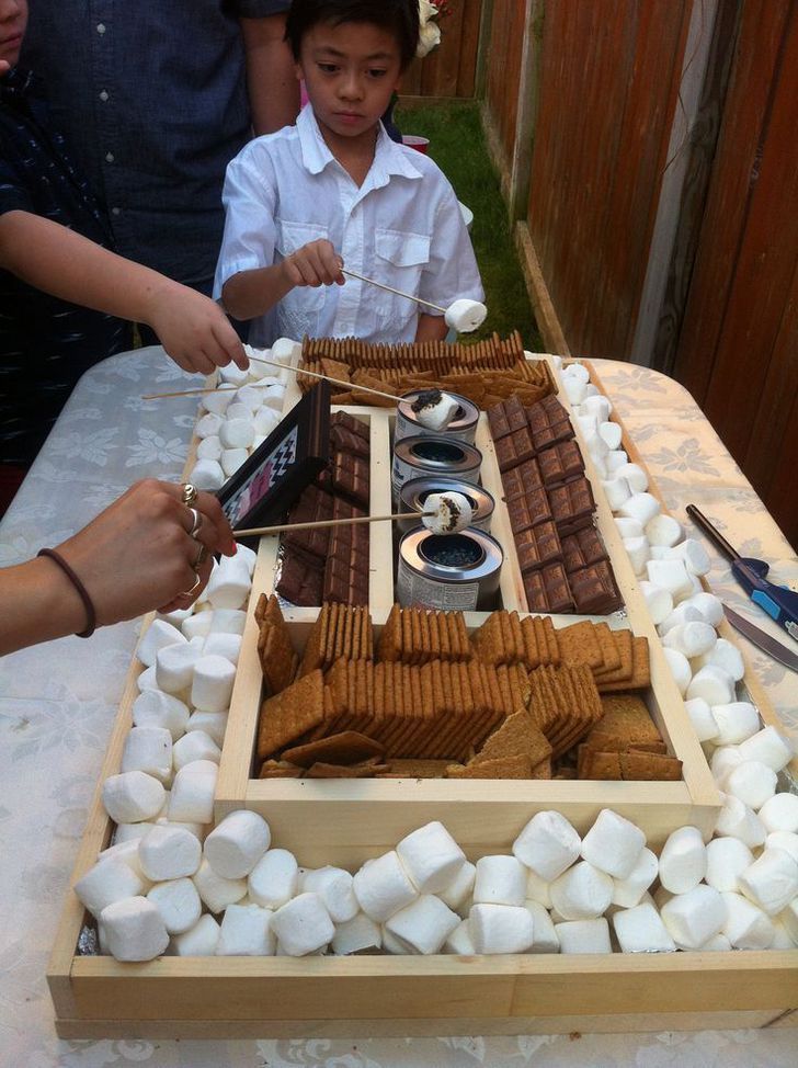 Engagement party DIY s’mores bar. Perfect for an outdoor party.