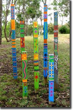 Garden totems. I would bet these would be easy to make…some 2 x 4’s, paint, stamps, etc. and stick in the ground.