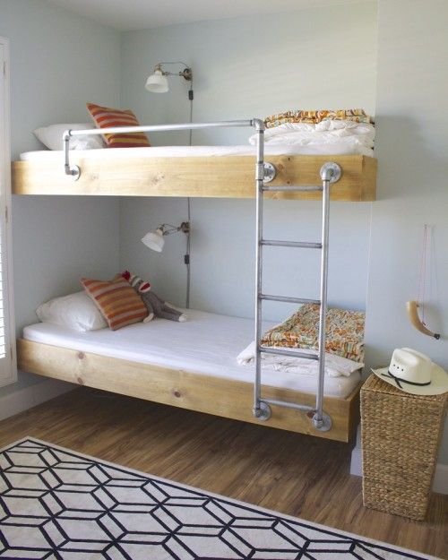 Great bunks. And I love the bedding folded at the foot of the bed. (It is not easy to make bunk beds!)