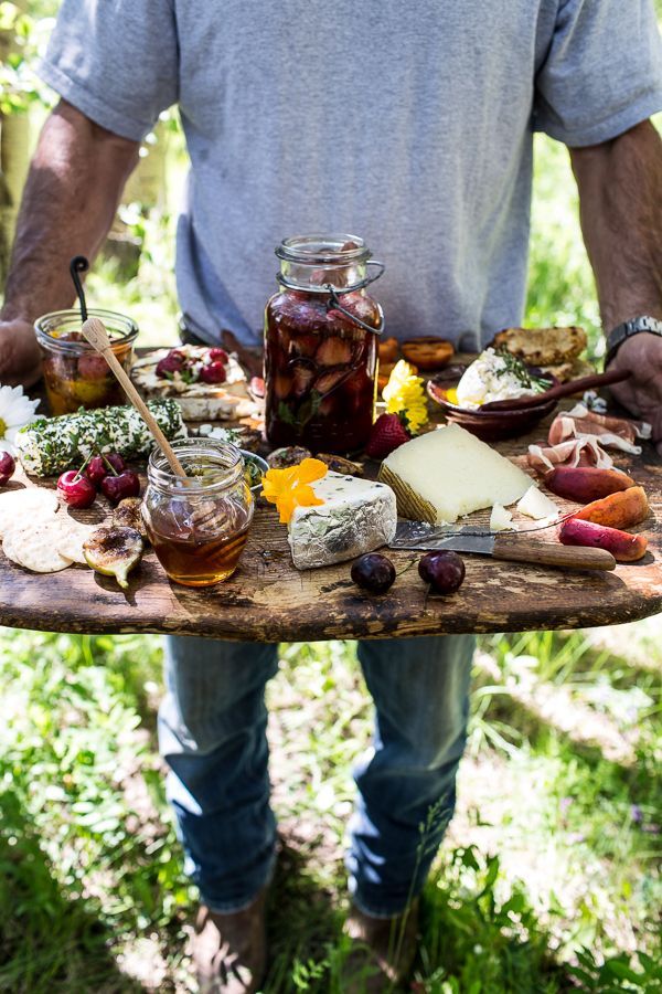 How to make a Killer Summer Cheeseboard by halfbakedharvest: With Pickled Strawberries + Herb Roasted Cherry Tomatoes.