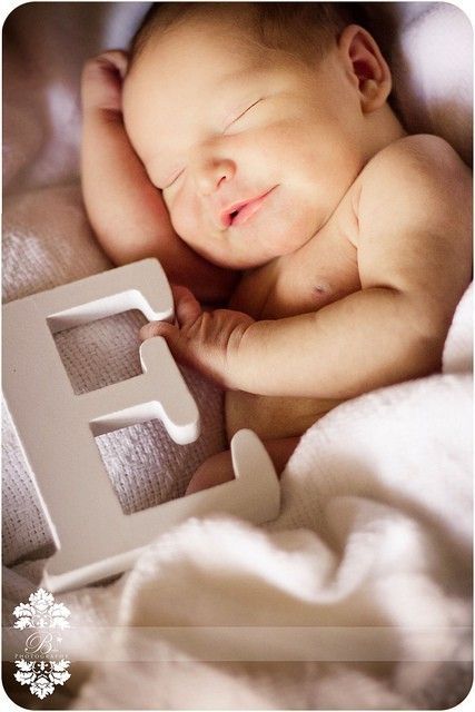 I know this is a baby but It made me think I should take a wooden letter with my sister’s initials for her senior pictures