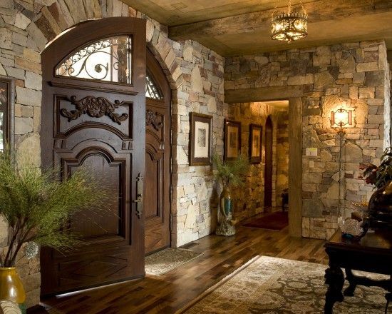 Love the rock and hard wood doors…Nice finish out for low ceiling entry – to get the most impact.