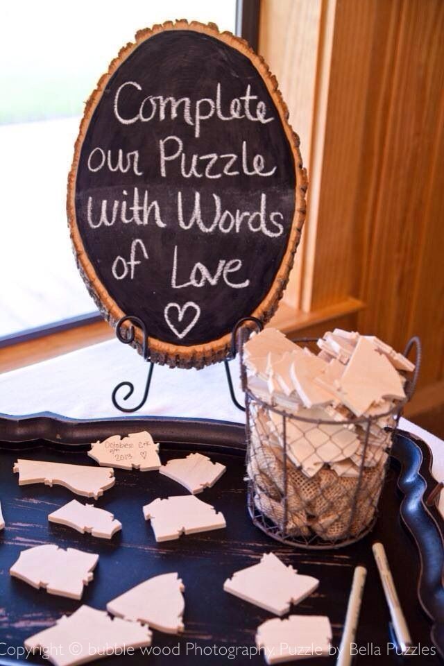 Modern version of a wedding guest book by Bella Puzzles. Cute chalkboard instruction sign! Photo by Bubblewood Photography.