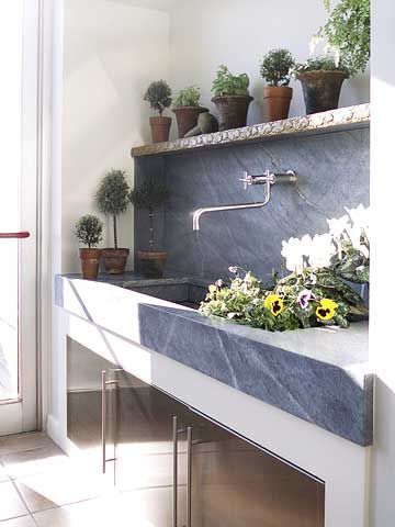 Mudroom – This soapstone counter with a doublewide, extra deep integrated sink is a great asset. With the vegetable garden just