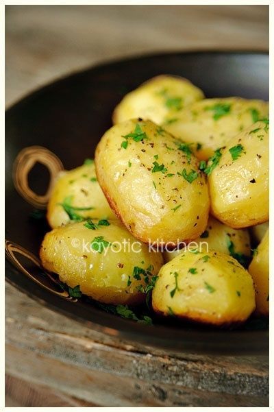 Potatoes baked in Chicken Broth, Garlic and Butter, SO GOOD! They get crispy on the bottom but stay fluffy inside. Chocked full of