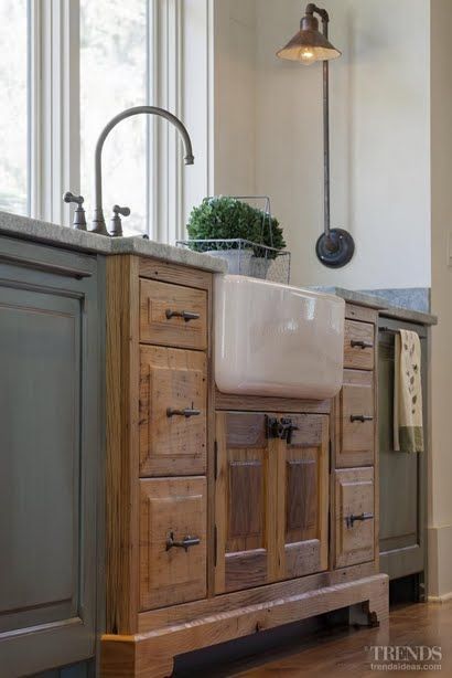 pretty, furniture-style sink base; love the wood with the blue
