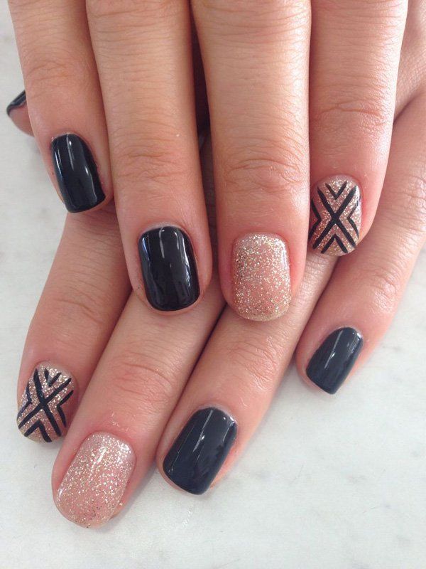 Pretty looking nail art in black matte, silver dust with criss-cross details in black polish.