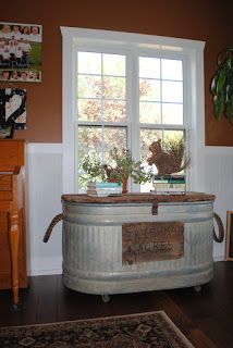 Recycled water trough would be perfect on the porch, you could store cushions inside during the winter. ~Irishman Acres~: