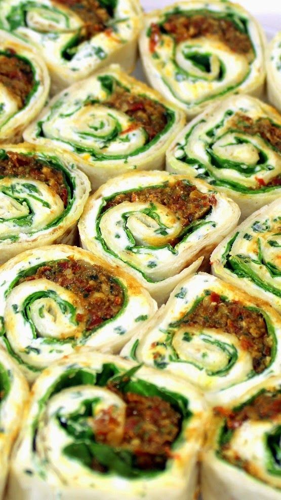 Spiral Spinach and Cheese Bites with Sun Dried Tomato Pesto  VERY VERY EASY… Burrito size Tortilla, a Fresh Made Herbed Cream
