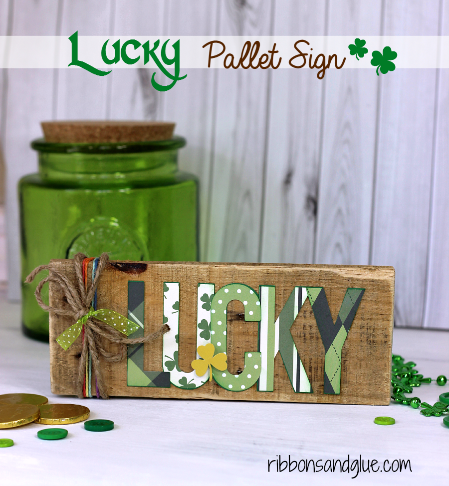 St Patrick’s Day Lucky Pallet Sign made with a silhouette cut file and scrapbooking paper.  Easy St Patrick’s Day craft!