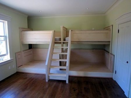 Twin over full built in bunk beds. Love the stairs!