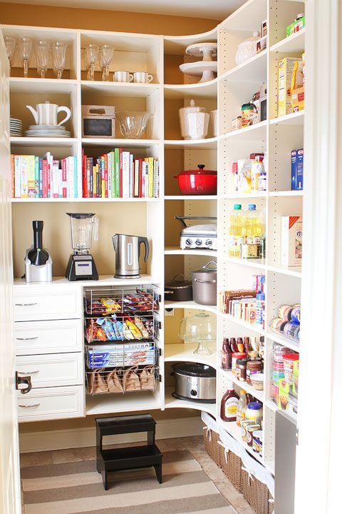 Walk-in pantry organization with a place for everything including appliances and entertaining dishes. Click for before & after