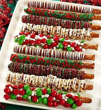 What a fabulous Christmas idea! Pretzel rods dipped in caramel and then decorated with various decadent treats! YUMMO!