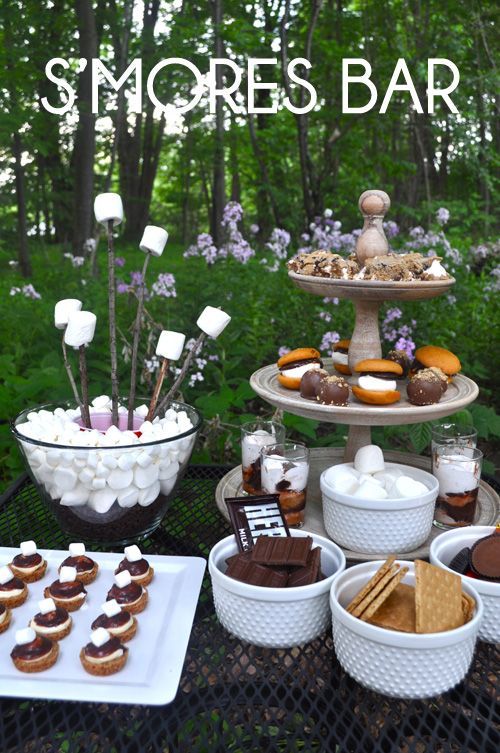 When the sun goes down and the fireflies come out- treat your guests to a S’mores Bar.