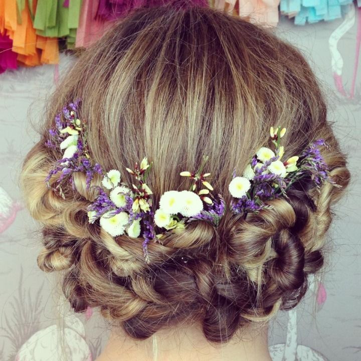 White, purple, and yellow wildflower bridal diadem. I think this wreath or half halo hairstyle would be amazing for bridesmaids or