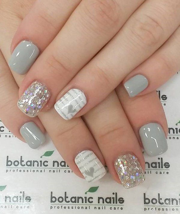 Gray glitter and heart nail art – Gray, white and silver nail art with embellishments. Light and cheery looking nail art with