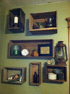 I have a collection of old crates that I have found and  love,  but what to do with them?  Maybe shelves on the kitchen  wall…