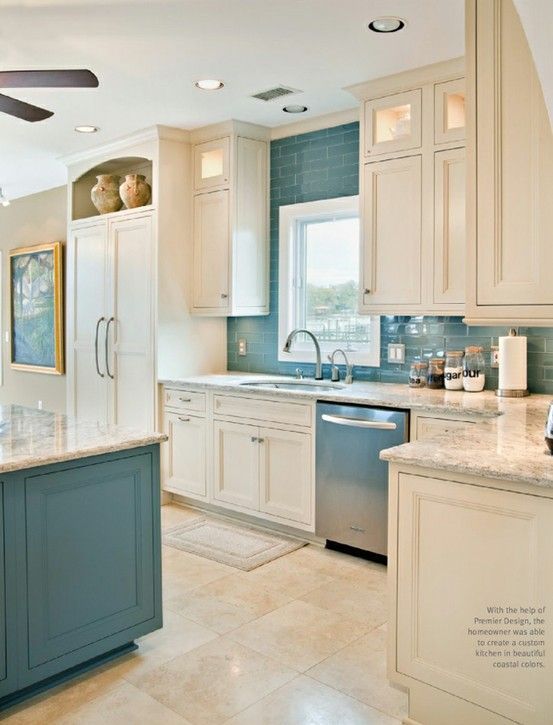 Love how they took the color from the wall and added it to the island… may have to consider when we redo our kitchen!