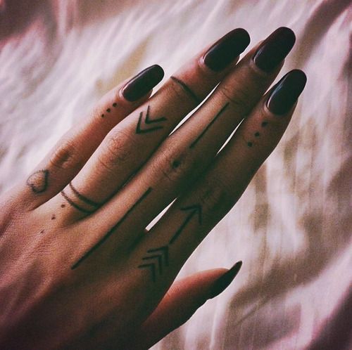 Pinning this for her eerily pretty pianist fingers. The tattoos and black nails make them seem even longer! Such a beautiful