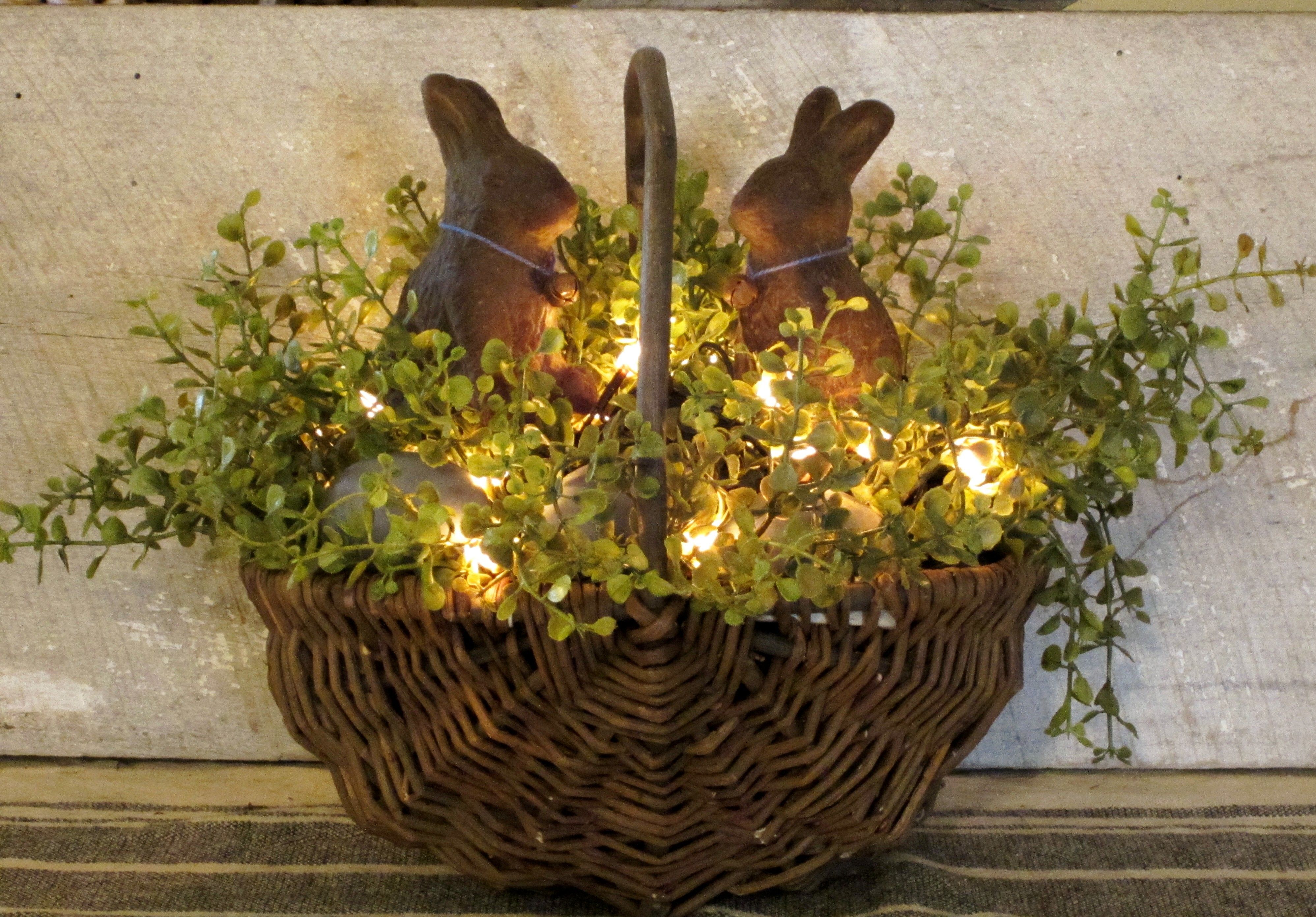 “Primitive Basket…with lights and beeswax bunnies.”  ( Truly lovely. What’s more I would like to change it with either the