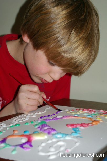 raised salt painting: create design with glue, cover glue with table salt. Touch watercolor brush on salt, without smearing and