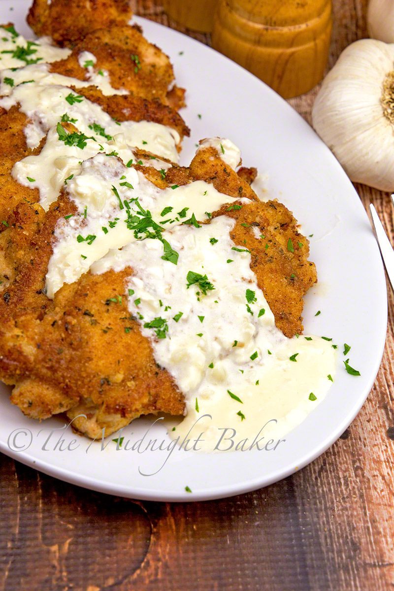 A dinner for garlic lovers! Succulent chicken topped off with a creamy garlic and Parmesan sauce. One-skillet easy! Having