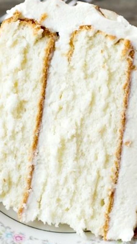 Almond Cream Cake ~ Light, moist and velvety, this cake has a homemade cooked, whipped frosting that pairs