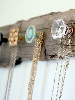 Attach old, funky dresser knobs on a weathered board to hang necklaces cute for a girls western bedroom. | Casual Crafter