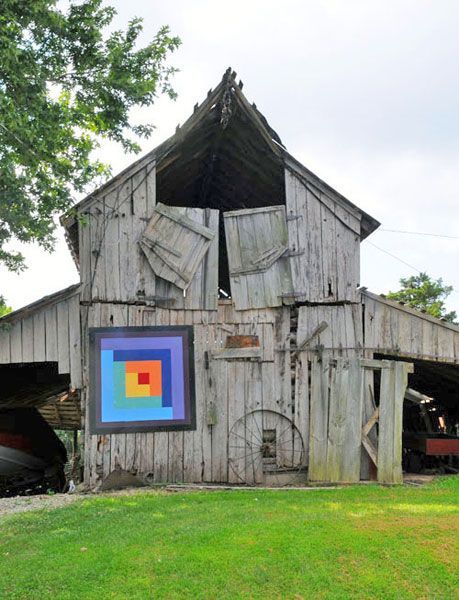 Barn quilt in Hardin Co., Illinois.  I think the quilt is the only thing holding it together :)