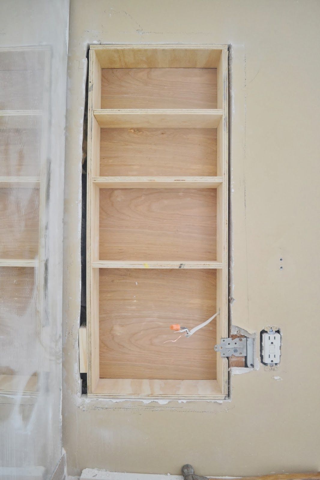 Between the Studs Storage – A TutorialUsing Stair Tread Nosing as Finishing Trim on Built-in ShelvesBetween The Studs Storage –