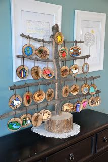 Gorgeous wooden Jesse Tree – love the painted wooden discs!